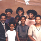 Top row: Stacey Abrams; brother Walter; sister Andrea and sister Leslie. Bottom row: Abrams’ father, Richard; sister Jeanine; brother Richard; and mother, Carolyn. (Courtesy of Stacey Abrams for Governor)